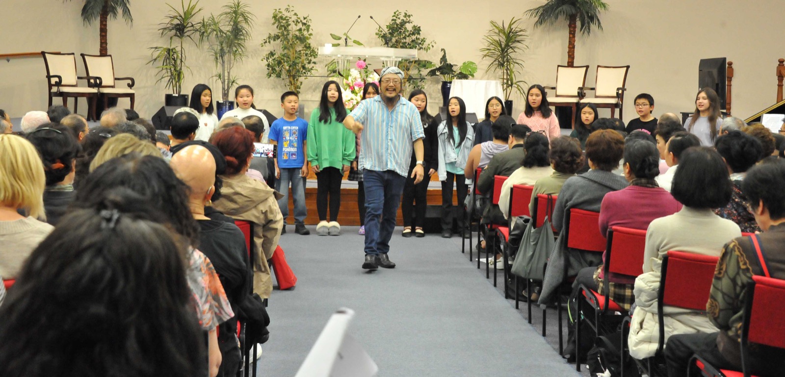 VoCo singers coming together in a massed choir rehearsal